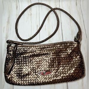 Elliott lucca leather metallic copper color,approx 12x6,woven corded handle.